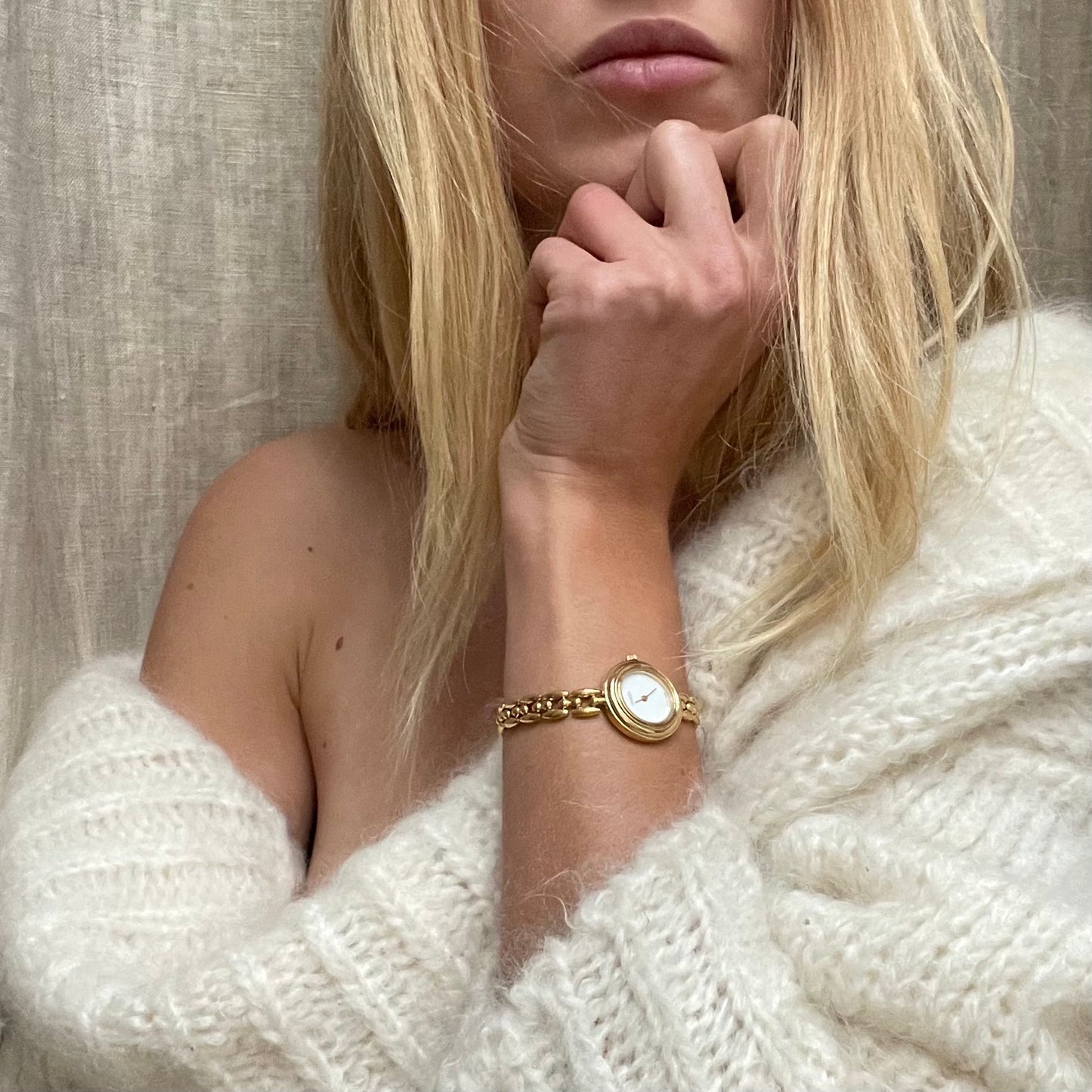 Gucci 26mm gold watch