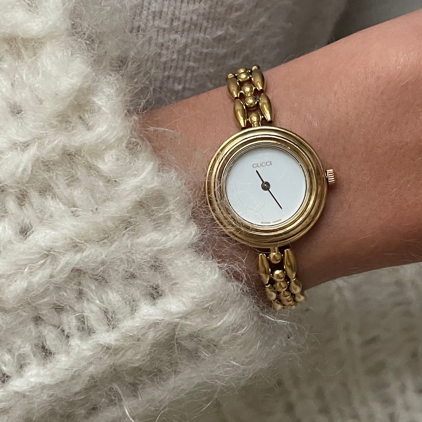 Gucci 26mm gold watch