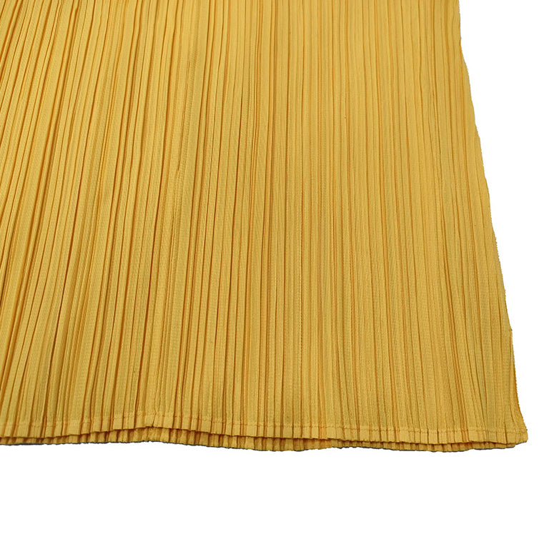 Issey Miyake Pleats Please yellow top