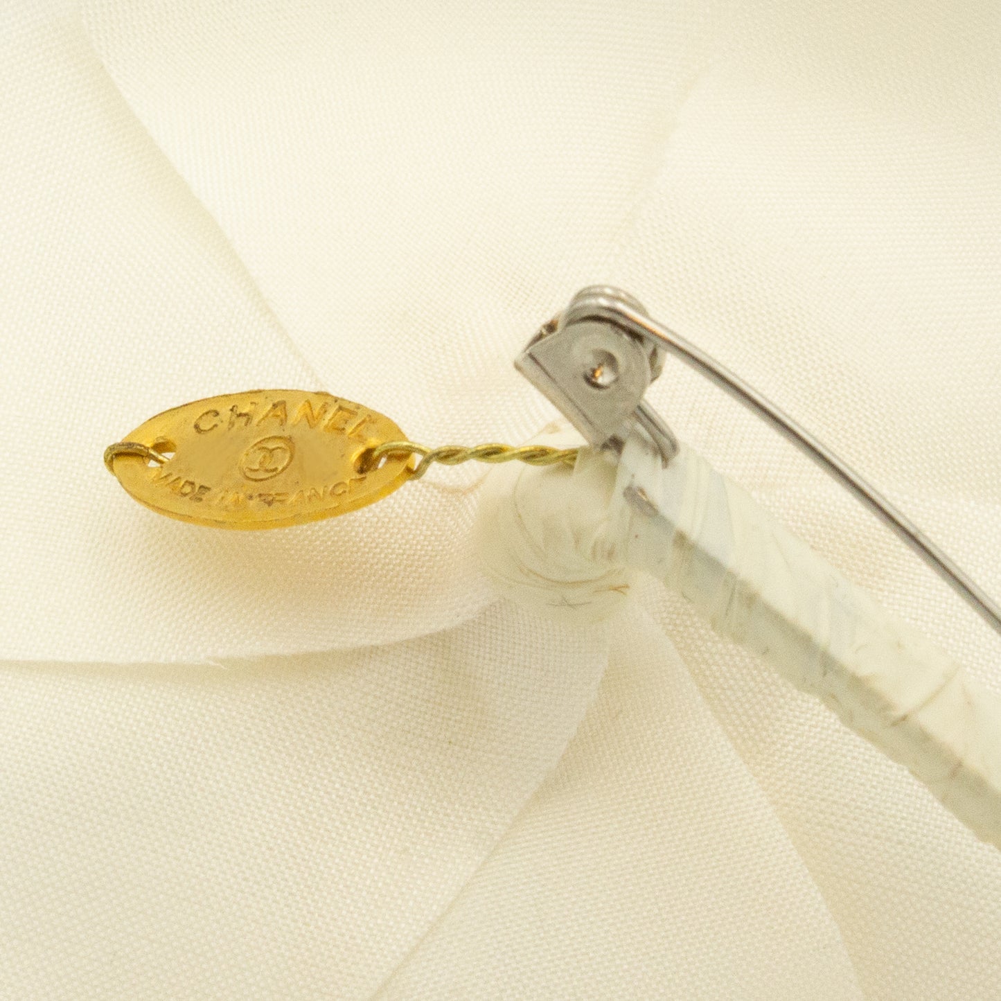 Chanel Camelia brooch